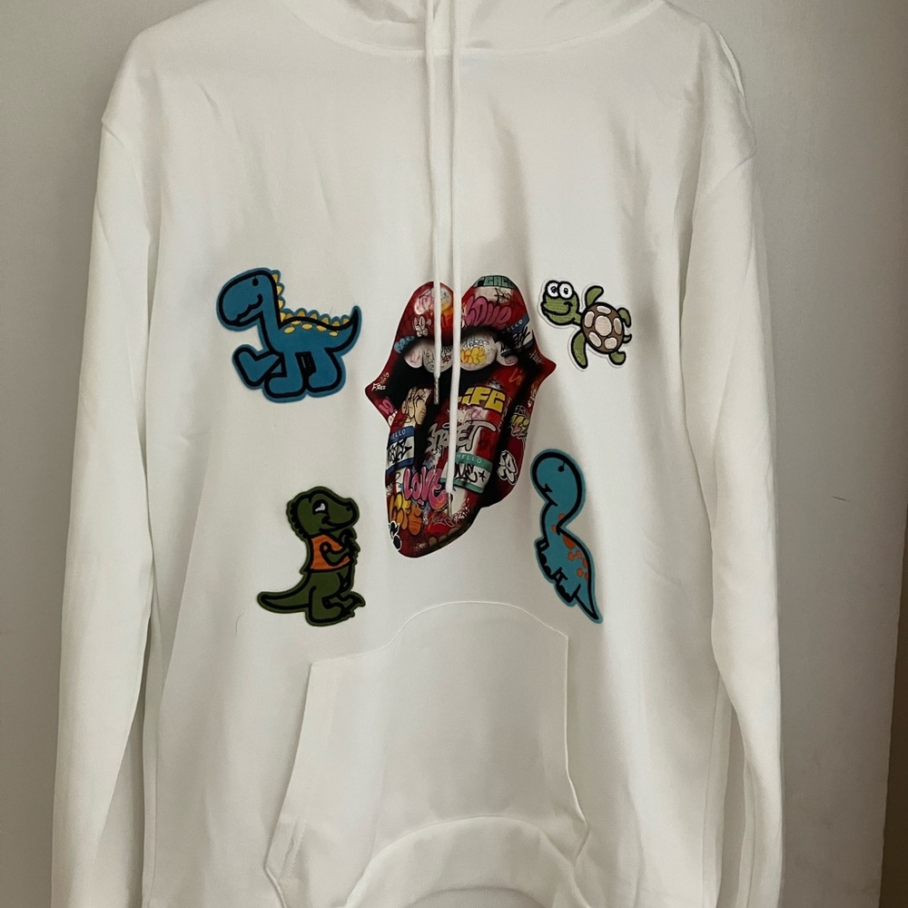 Ladies NWOT.  Never worn “ crazy sweatshirt” design